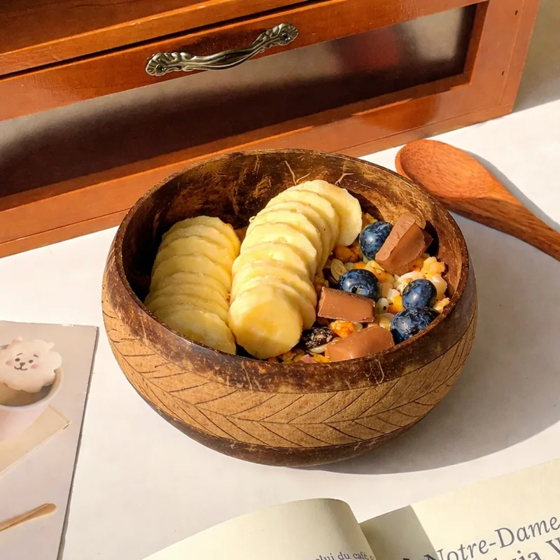 Engraved Coconut Shell Bowl with Palm Leaf Pattern – Handmade Natural Tableware 8 engraved coconut shell bowl filled with cereal and fruit