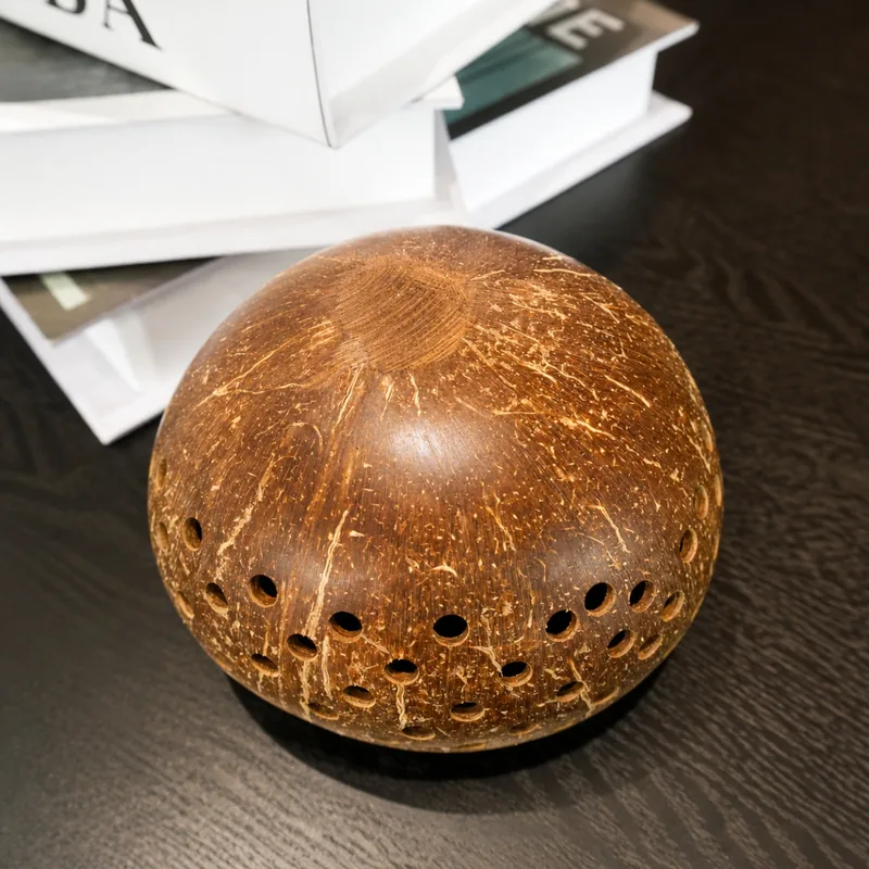 Perforated Coconut Shell Tealight Candle Holder – 10cm Handmade Décor 11 perforated coconut shell tealight candle holder base and drilled-hole detail