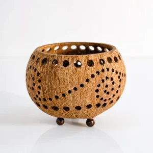 perforated coconut shell tealight candle holder spiral pattern front view