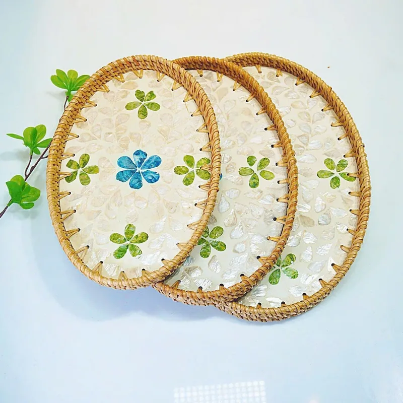 Handmade Rattan Mother-of-Pearl Oval Serving Tray lifestyle display Handmade Rattan Mother-of-Pearl Oval Serving Tray lifestyle display