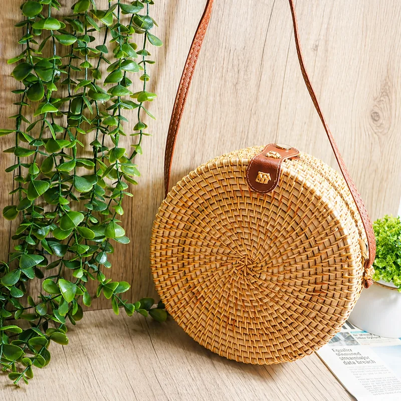 round rattan crossbody bag lifestyle product display round rattan crossbody bag lifestyle product display