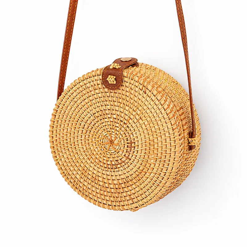 Round Rattan Crossbody Bag – 20cm Handmade Natural Woven Purse 10 round rattan crossbody bag angled view with shoulder strap
