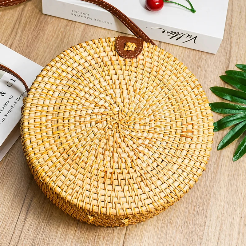 round rattan crossbody bag top-down lifestyle view round rattan crossbody bag top-down lifestyle view