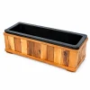 Wooden planter box with black plastic liner on a clean white background