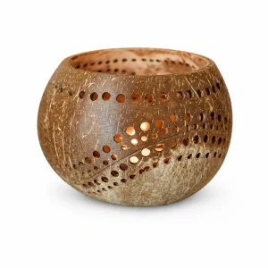 Coconut shell tealight candle holder with a rounded shape and wave perforations on white