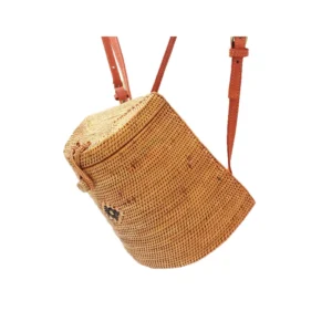 Natural rattan backpack with woven lid and two brown straps on white
