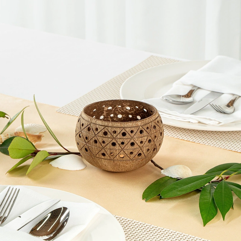 Geometric Carved Coconut Shell Candle Holder 3 The carved shell alongside a natural table setting.