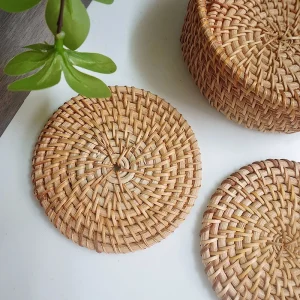 Close view of handwoven round coaster texture and wrapped edge