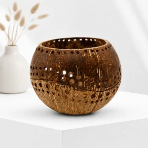 Unlit round coconut shell holder showing the wave pattern and natural shell markings