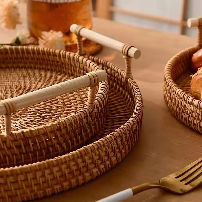 Close view of wrapped bamboo handles and handwoven rattan tray rims Close view of wrapped bamboo handles and handwoven rattan tray rims