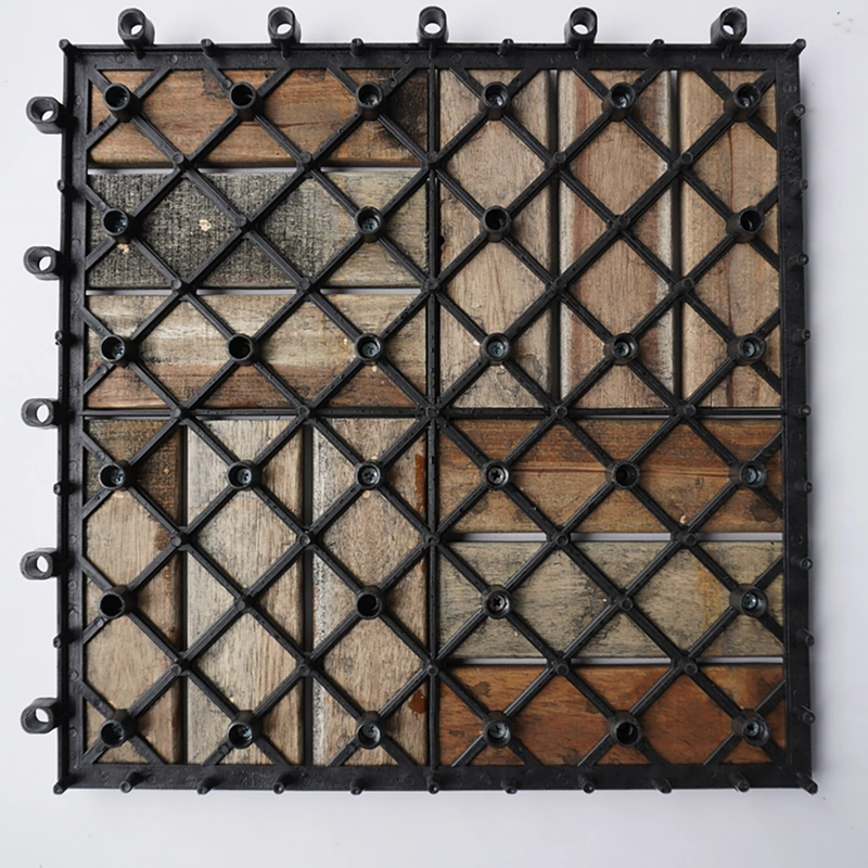 Underside of an acacia deck tile showing its interlocking PP base Underside of an acacia deck tile showing its interlocking PP base