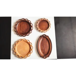 Round and oval wooden trays from the factory collection
