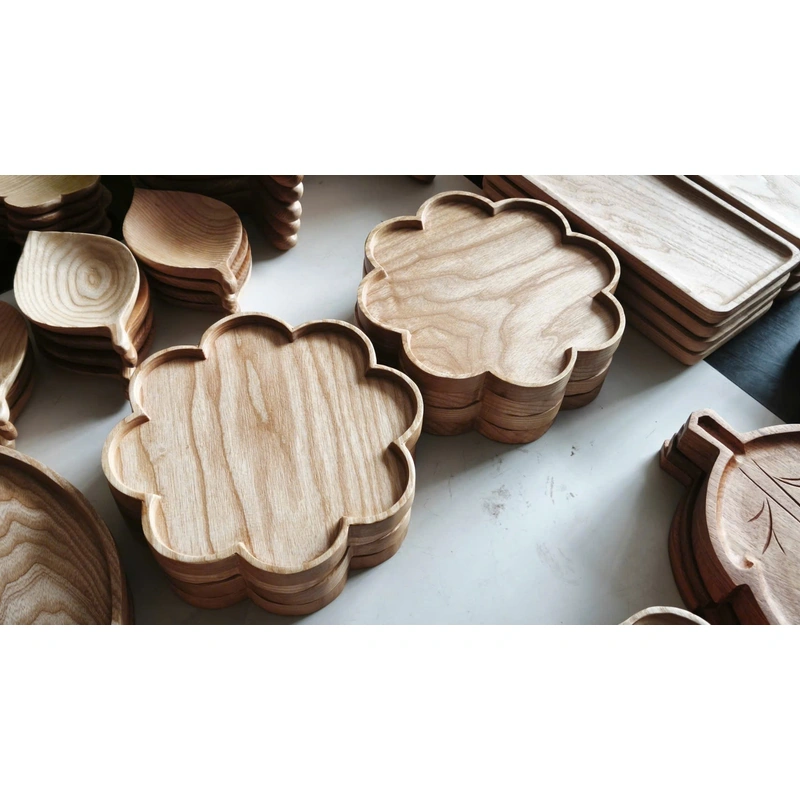 scalloped wooden trays on a workshop bench scalloped wooden trays on a workshop bench