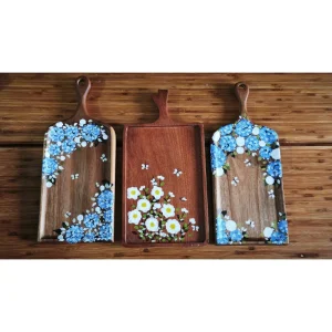 factory collection of rectangular wooden trays with decorated handles