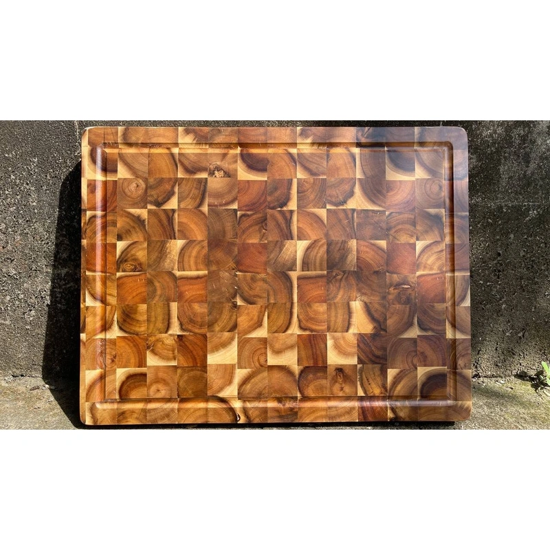 End grain wooden cutting board with a perimeter groove from the wider range End grain wooden cutting board with a perimeter groove from the wider range