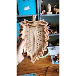 Split Leaf Wood Tray – Doussie Wood 2 Carved leaf-shaped wooden tray from the factory collection