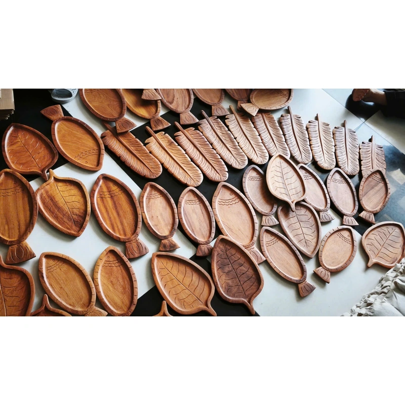 Carved wooden leaf and fish trays in the supplier collection Carved wooden leaf and fish trays in the factory collection
