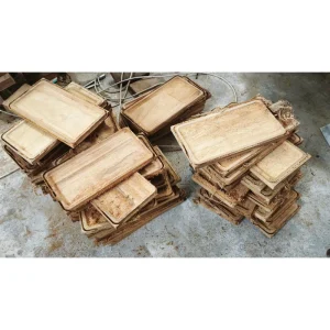 Long Rectangular Doussie Wood Tray 4 Stacks of rectangular wooden trays at the factory