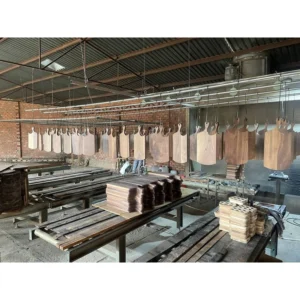 African Mahogany Octagonal Grooved Tray 25 cm 4 Wooden boards arranged during the production process