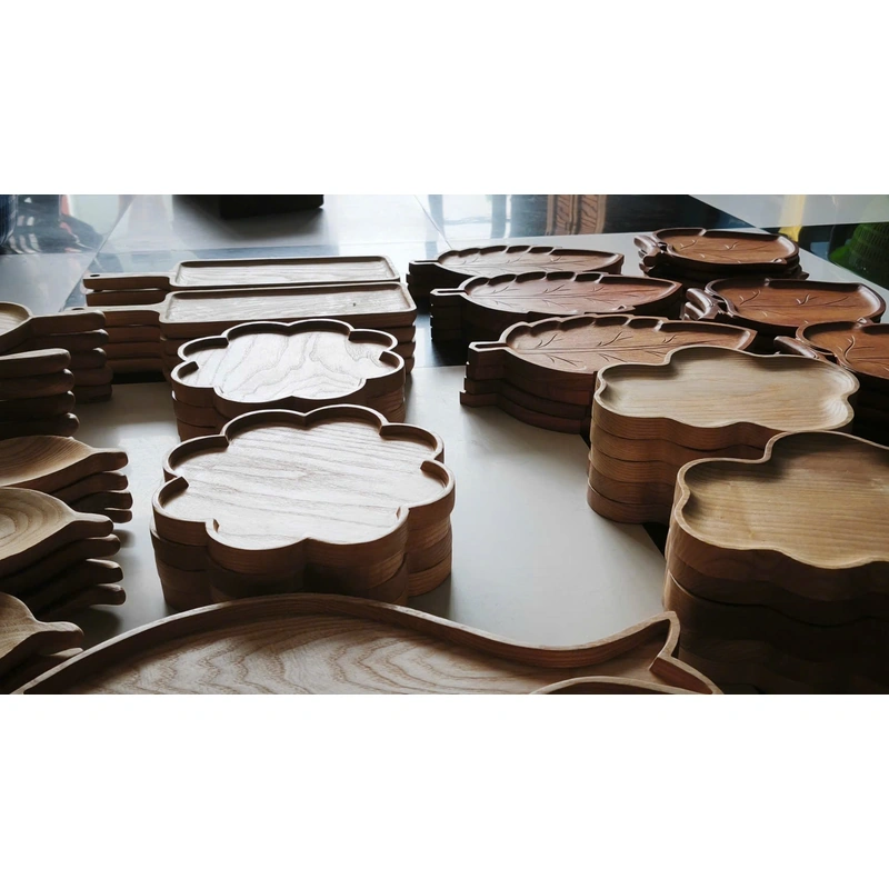 Stacks of shaped wooden trays at the factory Stacks of shaped wooden trays at the factory