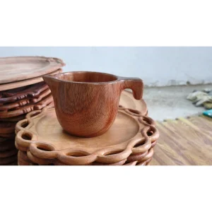 Textured Wood Coaster – Doussie Wood 5 Wooden cup displayed on a carved tray from the factory collection