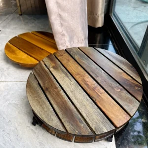 Round Dark Walnut Acacia Plant Caddy with Locking Wheels – 35cm 4 Close-up of dark walnut acacia slats and natural wood grain