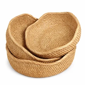 Nested handwoven rattan fruit trays showing weave and rim details