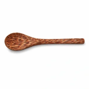 Coconut wood spoon showing its rounded head and natural wood grain