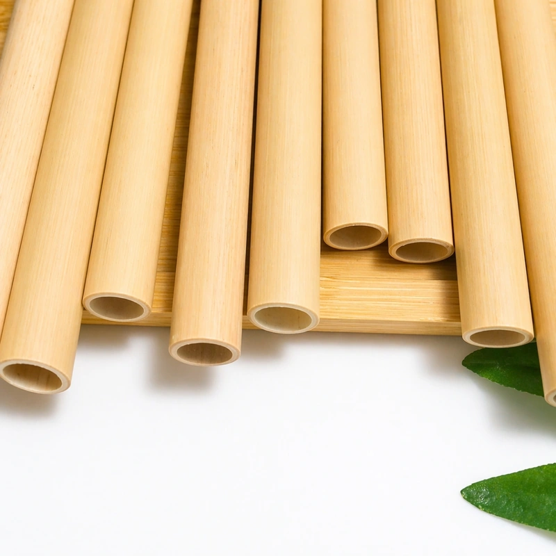 Hollow bamboo straw openings shown close up on a bamboo tray Hollow bamboo straw openings shown close up on a bamboo tray