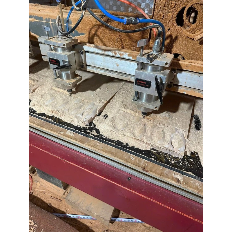 CNC equipment machining wooden components at the factory