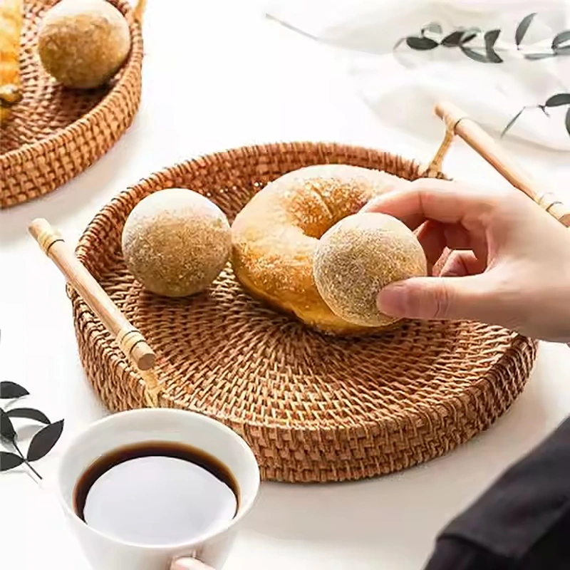 Wicker Basket, Round Dinner Plate with Handle 6 Round rattan tray with bamboo handles displaying bread beside a coffee cup