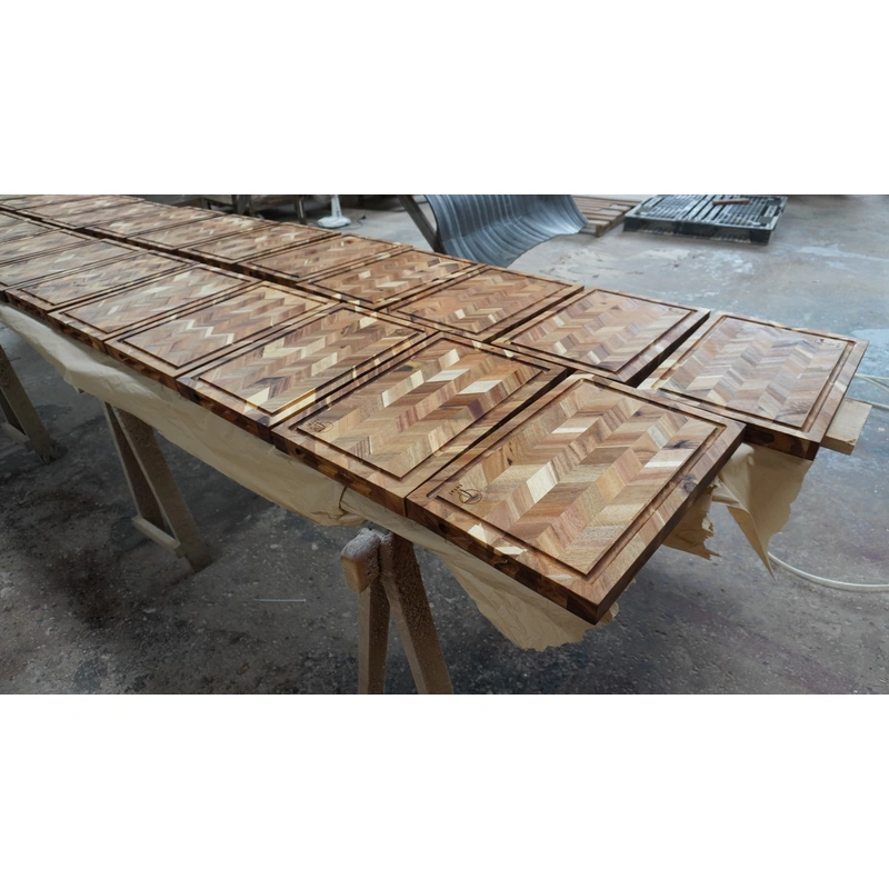 Premium Wooden Herringbone cutting board 6 Herringbone wooden cutting boards laid out during production