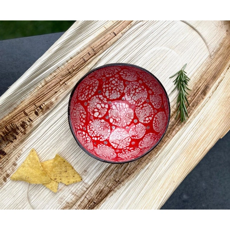 Red Mosaic Eggshell Coconut Bowl reference photograph. Red rounded-panel eggshell coconut bowl reference. Individual shell shapes and mosaic placement vary; food and accessories are presentation props.
