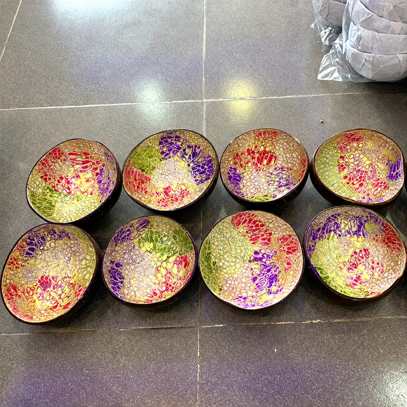 multicolour eggshell coconut bowl A photographed batch of multicolour eggshell bowls; each shell and mosaic arrangement varies.