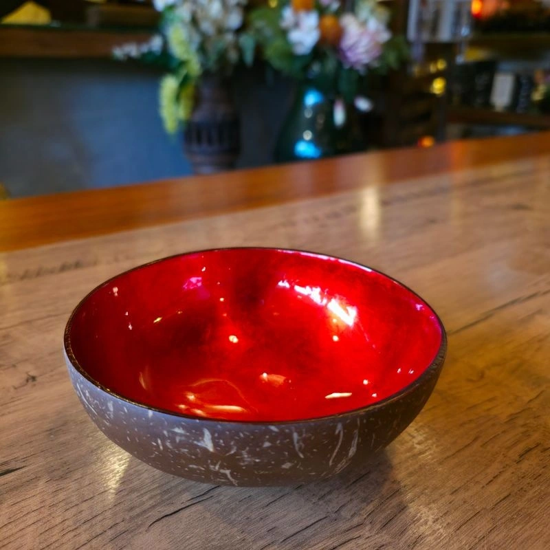 red interior lacquer coconut bowl Red interior finish in a styled setting.