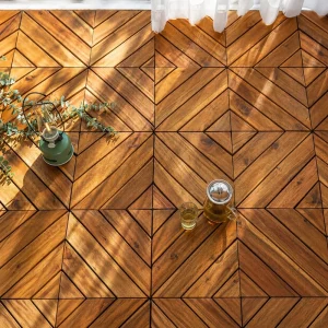 Vietnam acacia deck tiles installed in a geometric pattern beside plants and a tea set