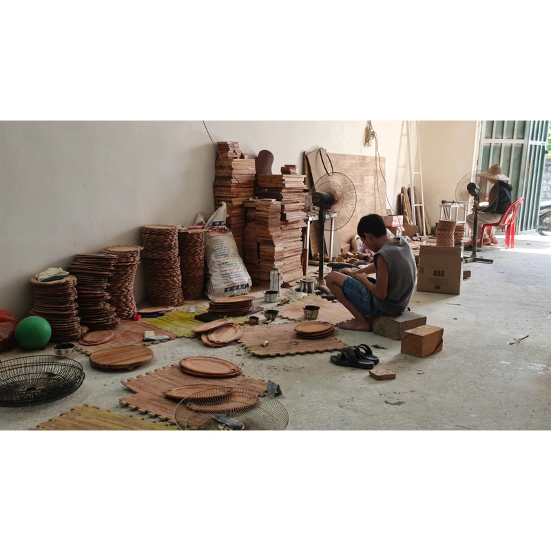 Wooden tableware being prepared at the factory