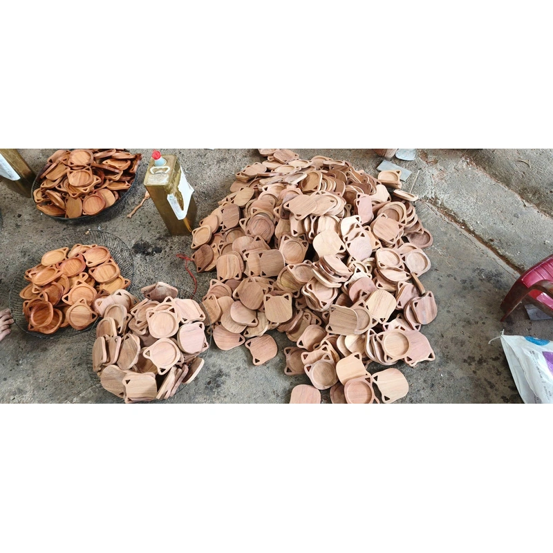 Batches of shaped wooden trays at the factory