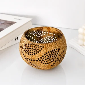 Coconut shell candle holder styled with books on a tabletop