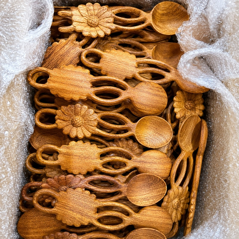 Carved floral wooden spoons with openwork handles in protective packing Carved floral wooden spoons with openwork handles in protective packing