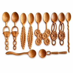 Decorative wooden spoons with carved floral and openwork handles on white