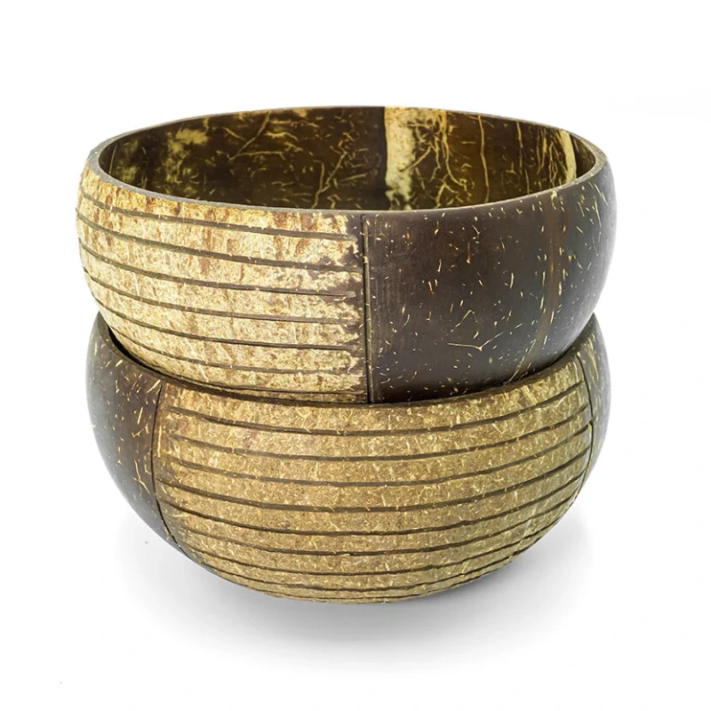 Stacked striped coconut bowls from the same product family Stacked striped coconut bowls from the same product family