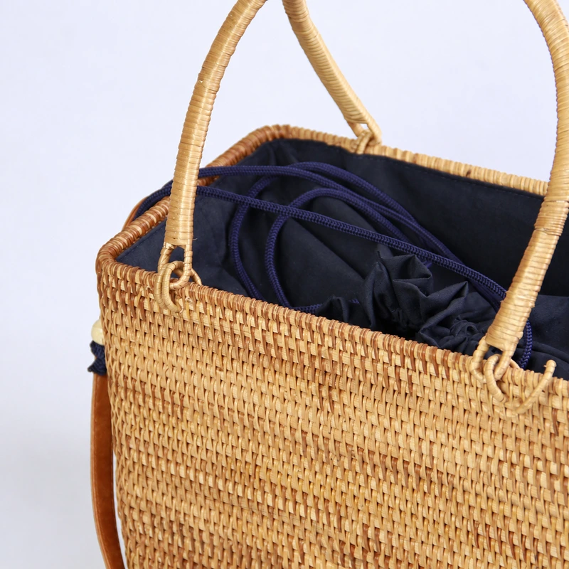 twin handle rattan shoulder bag construction detail