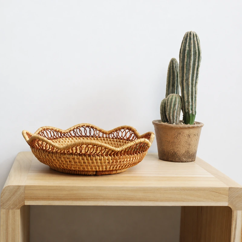 Scalloped Rattan Tray | 2 Handwoven Sizes 8 Rattan trays styled beside a cactus