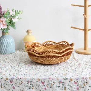 Nested shallow trays showing their openwork rims
