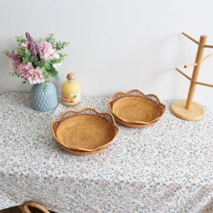 Scalloped Rattan Tray | 2 Handwoven Sizes 2 Scalloped trays in two sizes on a tabletop