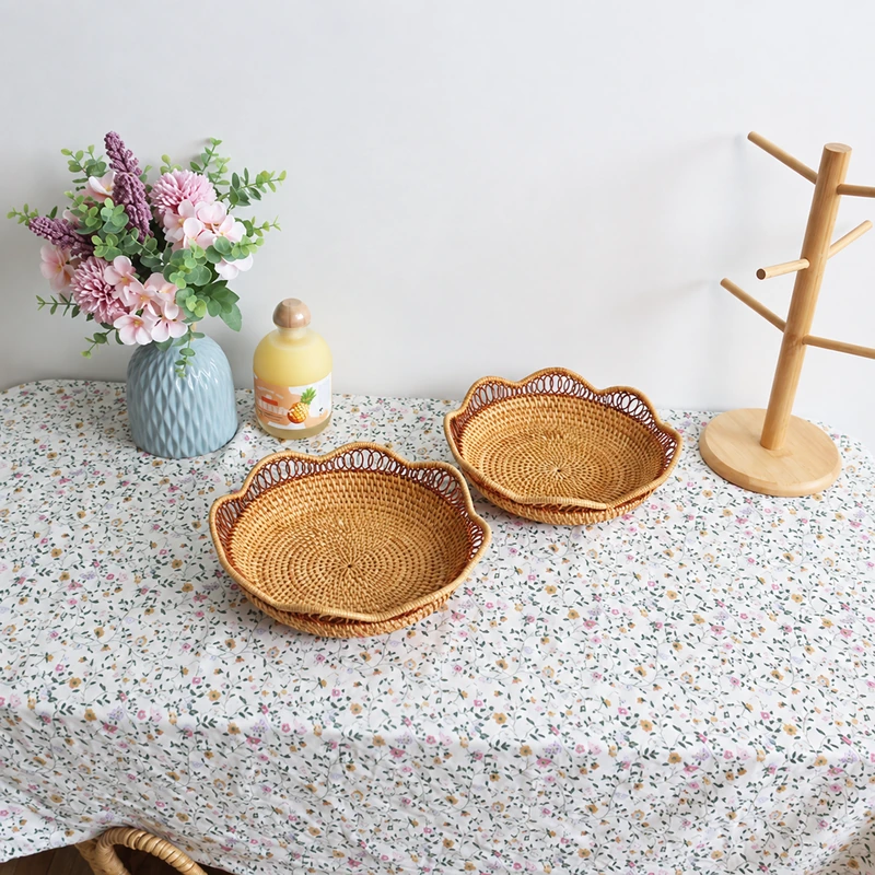 Scalloped trays in two sizes on a tabletop Scalloped trays in two sizes on a tabletop