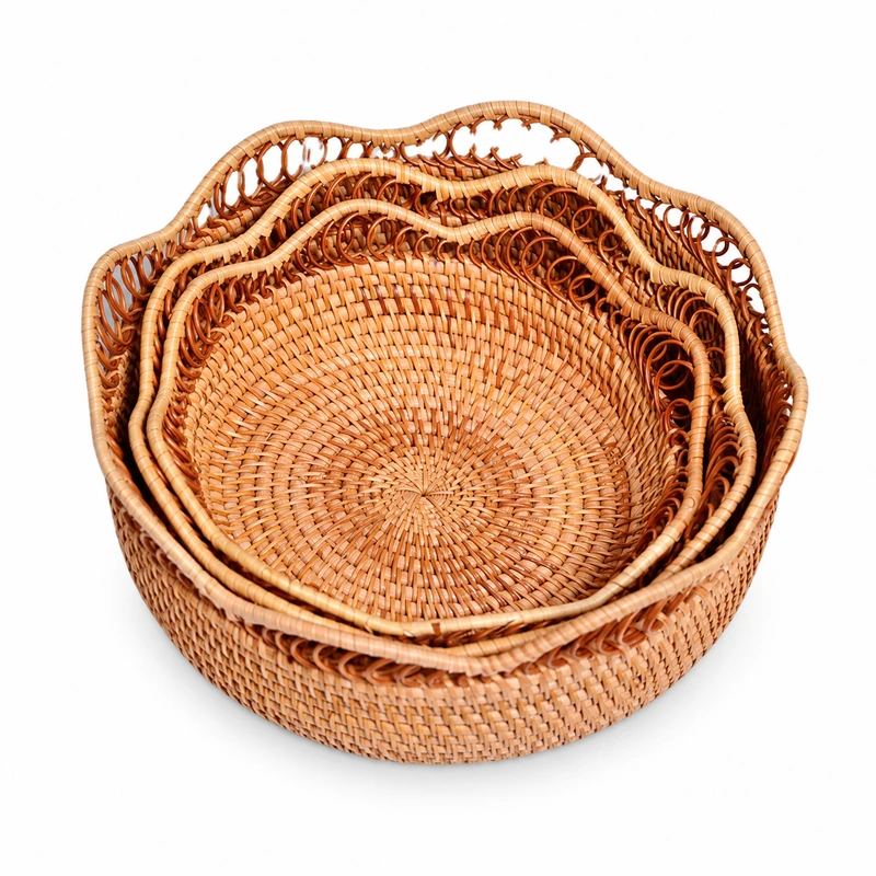 Three nested decorative rattan fruit baskets on white Three nested decorative rattan fruit baskets on white