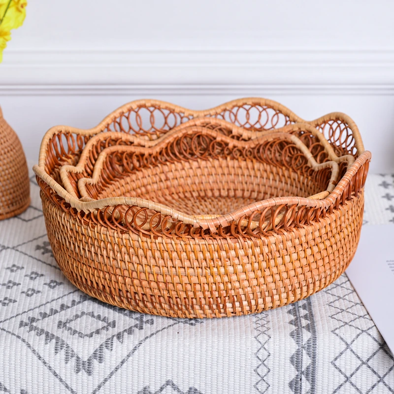 Three graduated decorative baskets nested together Three graduated decorative baskets nested together
