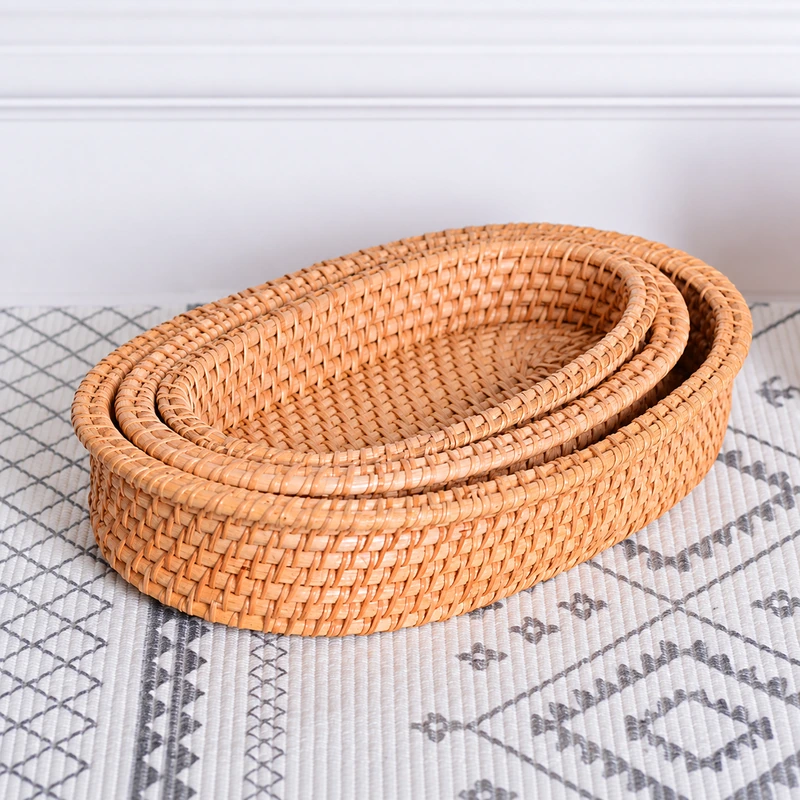 Oval Nesting Rattan Baskets | Set of 3 1 oval nesting rattan baskets product photograph